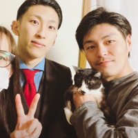 抱っこされるきいちゃんと家族の記念写真