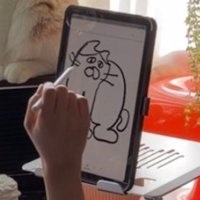 タブレットに描かれたゆるいタッチの猫のイラスト