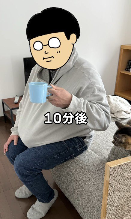 ソファに座る飼い主