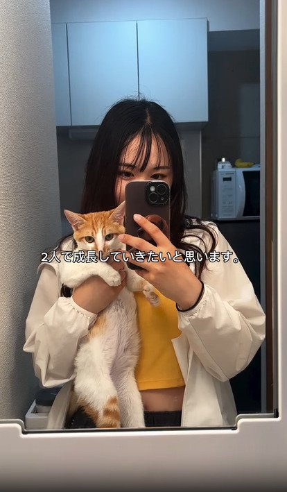 飼い主さんと猫のツーショット