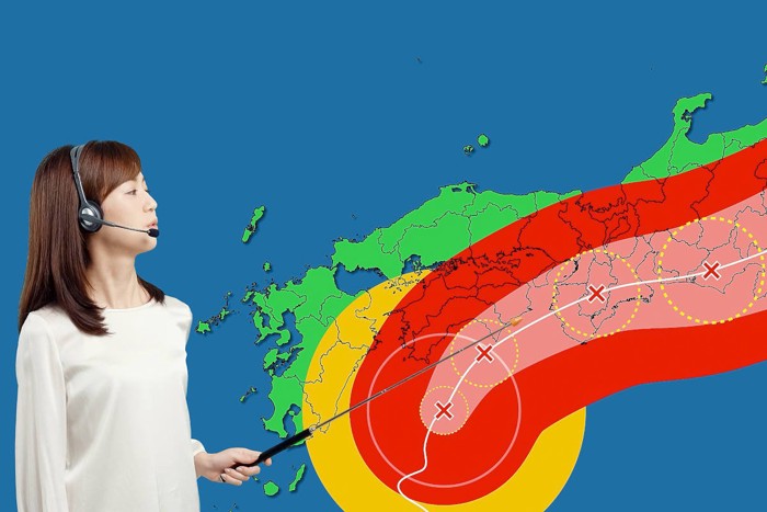 台風情報を伝えるお天気キャスター