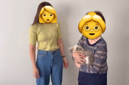 猫を抱っこするおばあちゃん