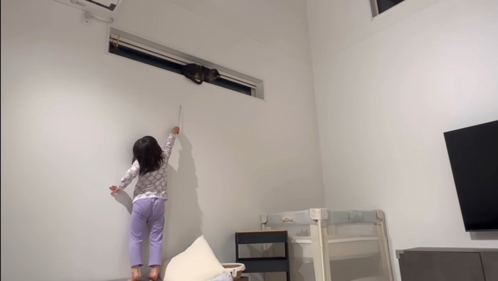 オモチャの杖で