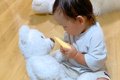 赤ちゃんと大型犬の…の画像