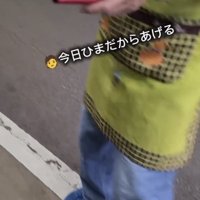 エプロン姿の人
