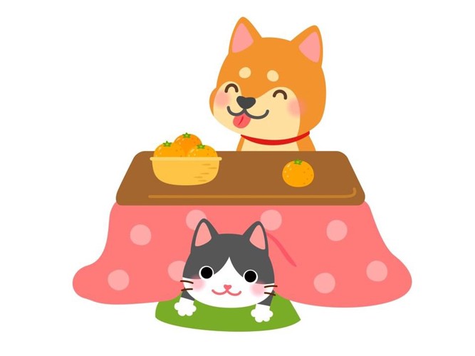 こたつに入る犬と猫のイラスト