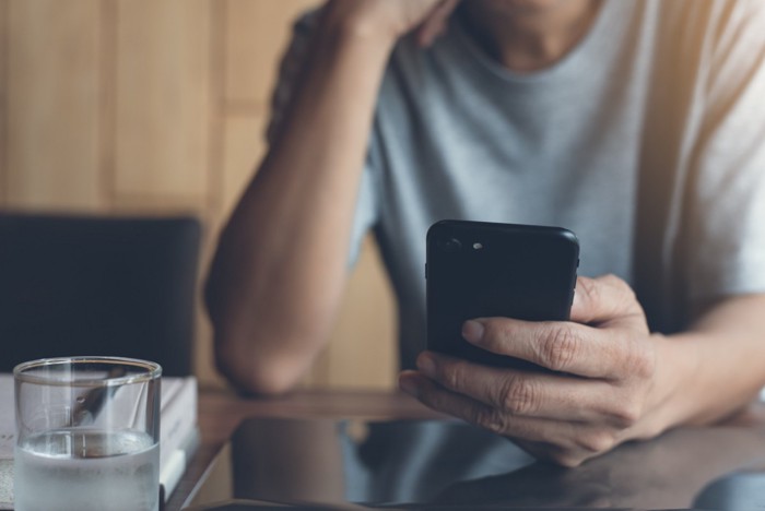 Man using smartphone